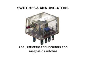 Tattletale amplifiers with an array of switches and annunciators, showcasing the design of magnetic switches